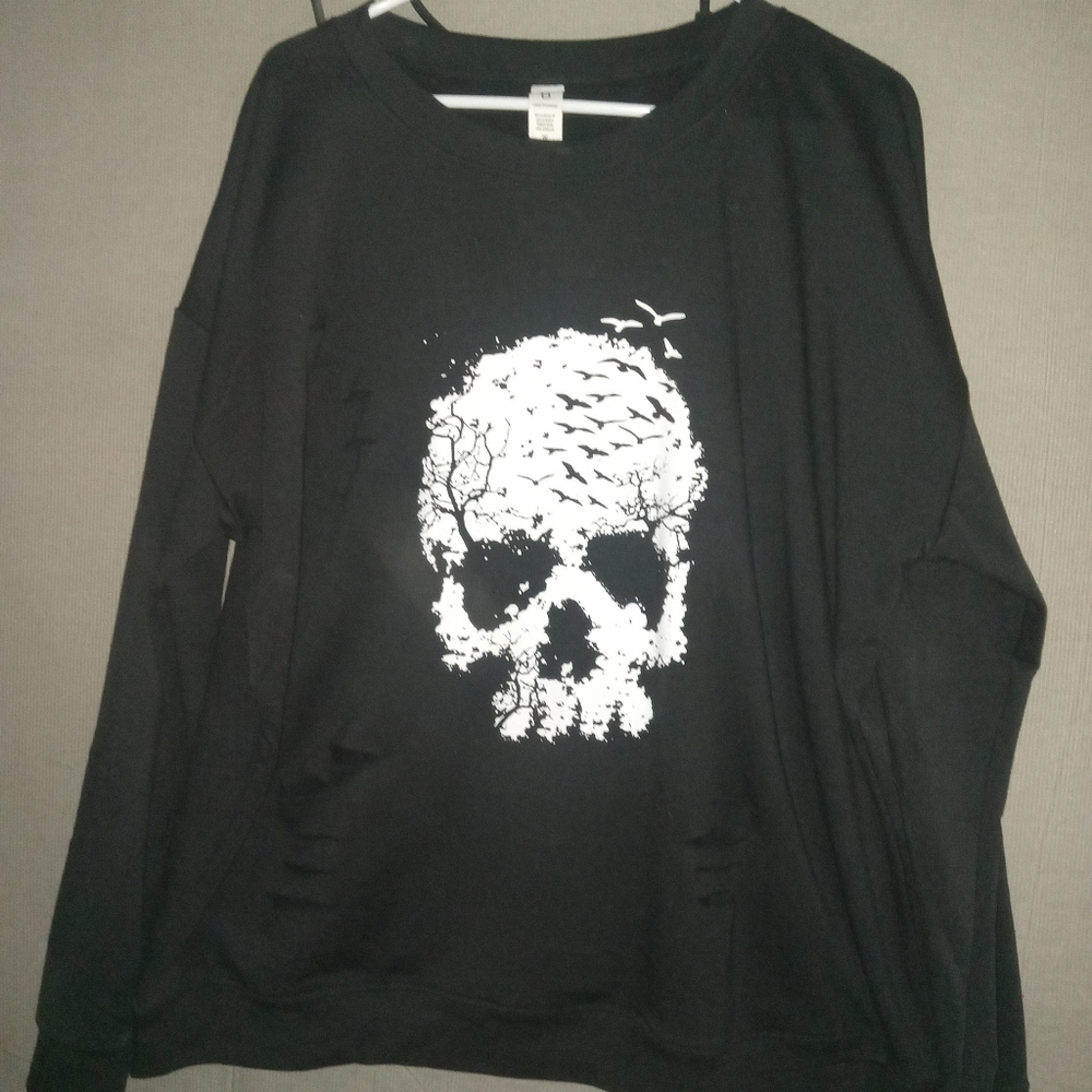 Ripped skull sweater